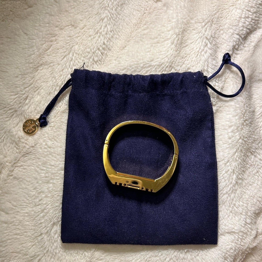 Tory Burch fit bit bracelet with dust bag. Worn twice, condition like new.